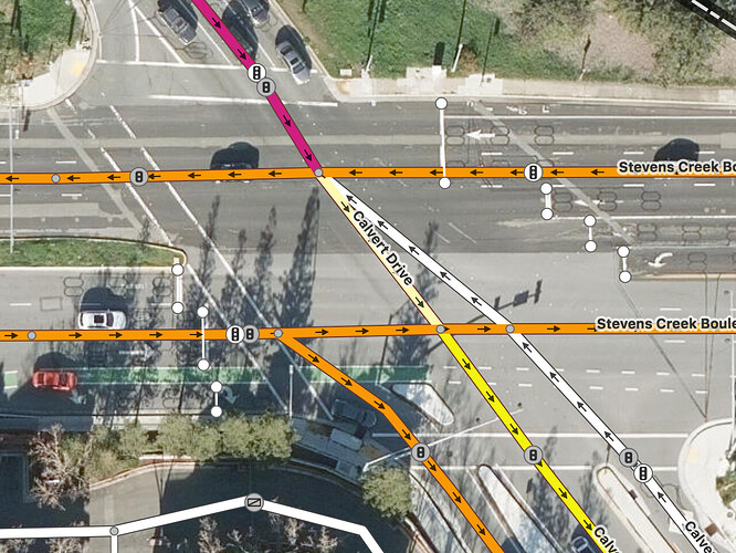 A series of road markings is staggered lane by lane at the intersection of Stevens Creek Boulevard and Calvert Drive. (Background courtesy of Esri)
