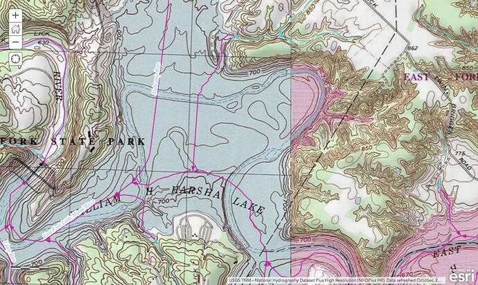 William H. Harsha Lake with the East Fork Little Miami River running through it on a mosaic of two USGS topographic maps, with NHD artificial paths again overlaid in purple. The topo map to the left shows the reservoir with the river channel winding through elevation contour lines, while the topo map to the right shows the reservoir in red edited onto an older map from before the reservoir’s completion. In the newer map, a significant meander to the north is bypassed in favor of a shorter artificial path, forcing its tributaries to the north, Slabcamp Run and Elk Lick, to run along straight lines to meet it south of the former natural mouth.