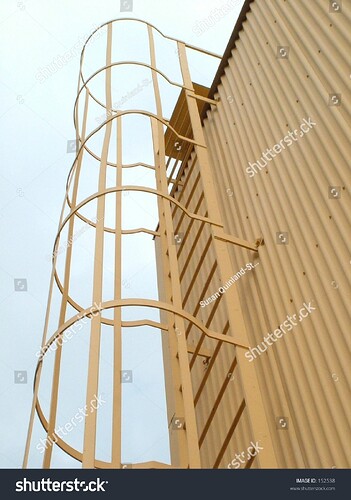 stock-photo-safety-ladder-going-up-side-of-building-152538