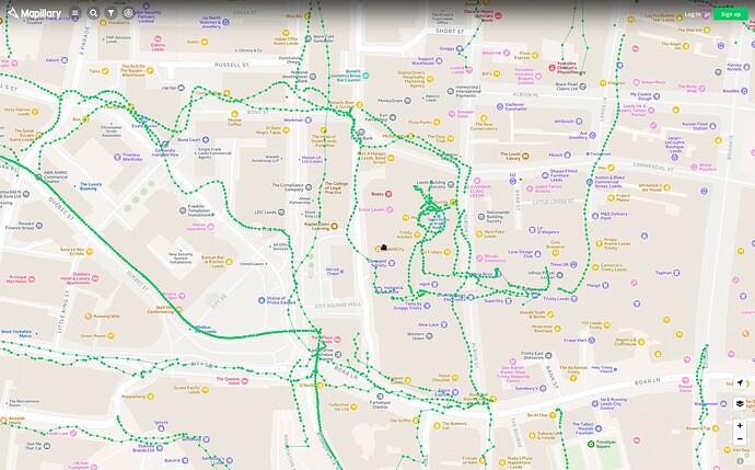 Screenshot of Mapillary in Leeds, UK. The background map shows a lot of POIs that are not from OSM, but from Overture