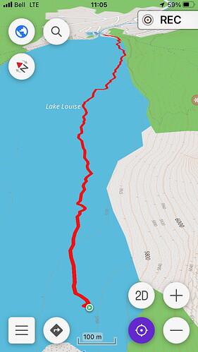 A screenshot of OsmAnd recording a track zigzagging furiously across Lake Louise.