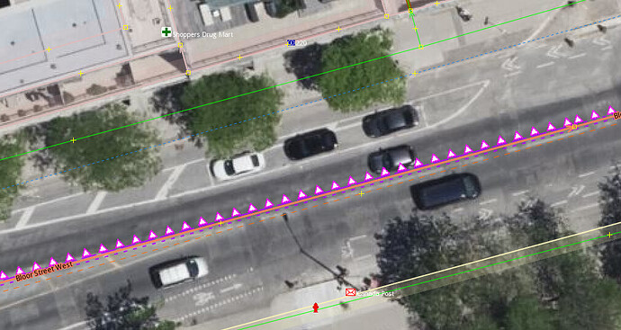 a stretch of street tagged as no parking on north side, but aerial imagery shows a dedicated parking space there