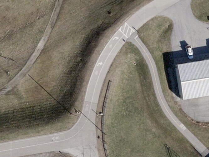 A bidirectional bike-hike path briefly follows the western side of a road before departing for a dedicated bike path. (Ohio Statewide Imagery Program, public domain.)