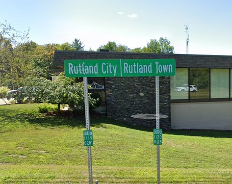 A sign marking the boundary between Rutland City and Rutland Town