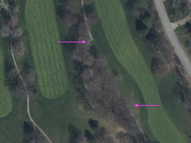 An interruption in a golf cart path about 230feet long (70m).