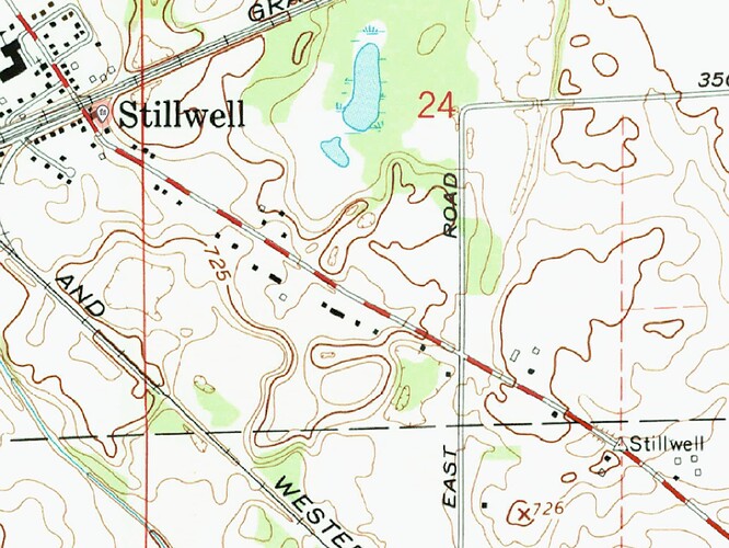 A topographical map showing a survey control point labeled “Stillwell” down the road from a village also labeled “Stillwell”, with a selected node beside it.
