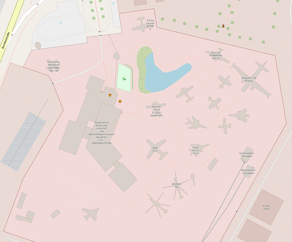 Screenshot von der OSM-Karte vom Deutschen Luftschiff und Marinefliegermuseum in Nordholz: Flugzeuge und Hubschrauber sind als Gebäude erfasst, damit sie in der OSM-Karte gezeichnet werden.