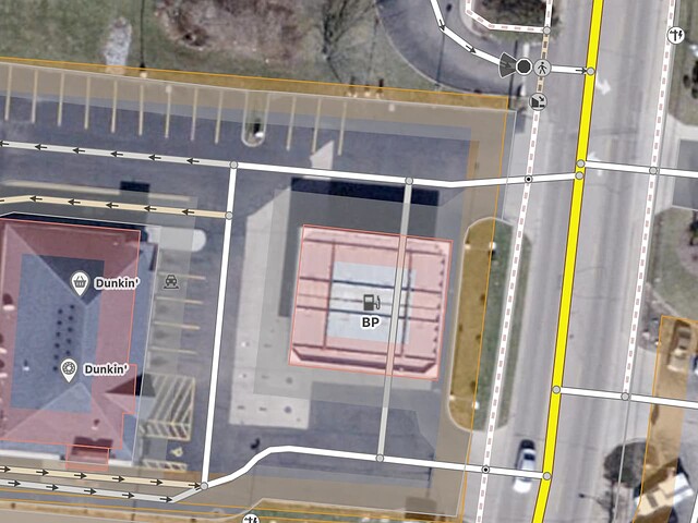 A pair of entrance and exit driveways in and out of a BP gas station and Dunkin’ Donuts shop, each about two cars wide. (Orthoimagery courtesy of the Ohio Statewide Imagery Program in the public domain.)